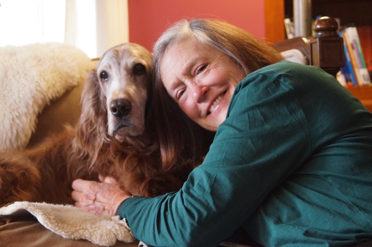 Mary Lynn Broe with her Irish setter